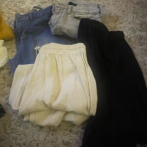- Black, Cream, Blue jeans sized pants is 3 and 2 pairs is small size